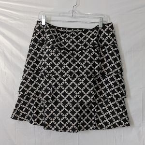 White House Black Market, Black with interlocking rings, 3 tiered skirt, size 10